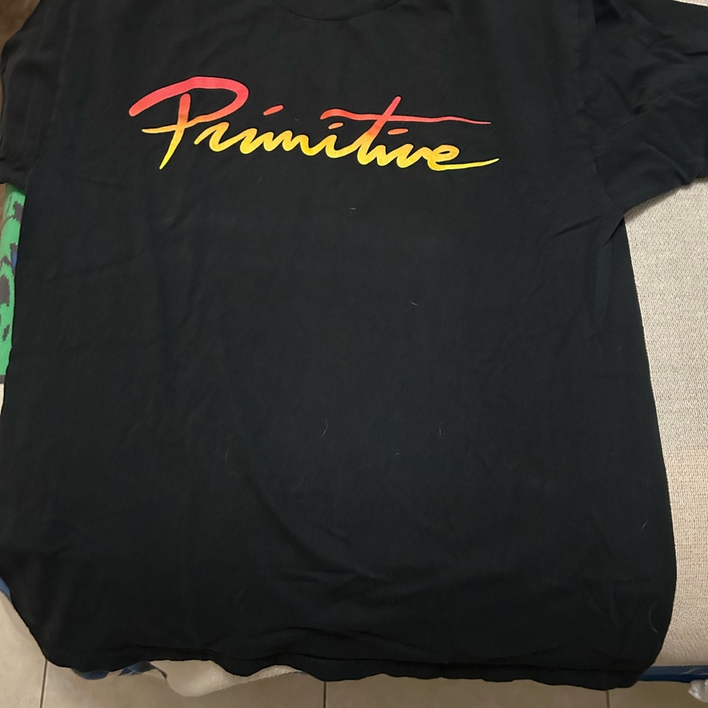 Primitive Black T-Shirt with Red and Yellow Logo